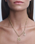 GOLD BAGUETTE DIAMOND HORSESHOE HINGED CHARM