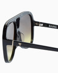 BANG SUNNIES IN BLACK WITH BROWN-YELLOW LENSES