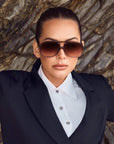 BANG BANG SUNNIES IN CHOCOLATE/CRYSTAL WITH ORANGE LENSES