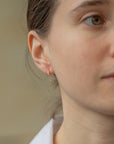 DIAMOND HOOP EARRINGS WITH EYE PENDANT