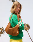 MOYEN MESSENGER IN TAN RATTAN