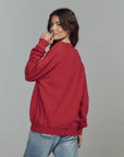 COLLEGE SWEATSHIRT IN RED WITH SLEIGH GRAPHIC